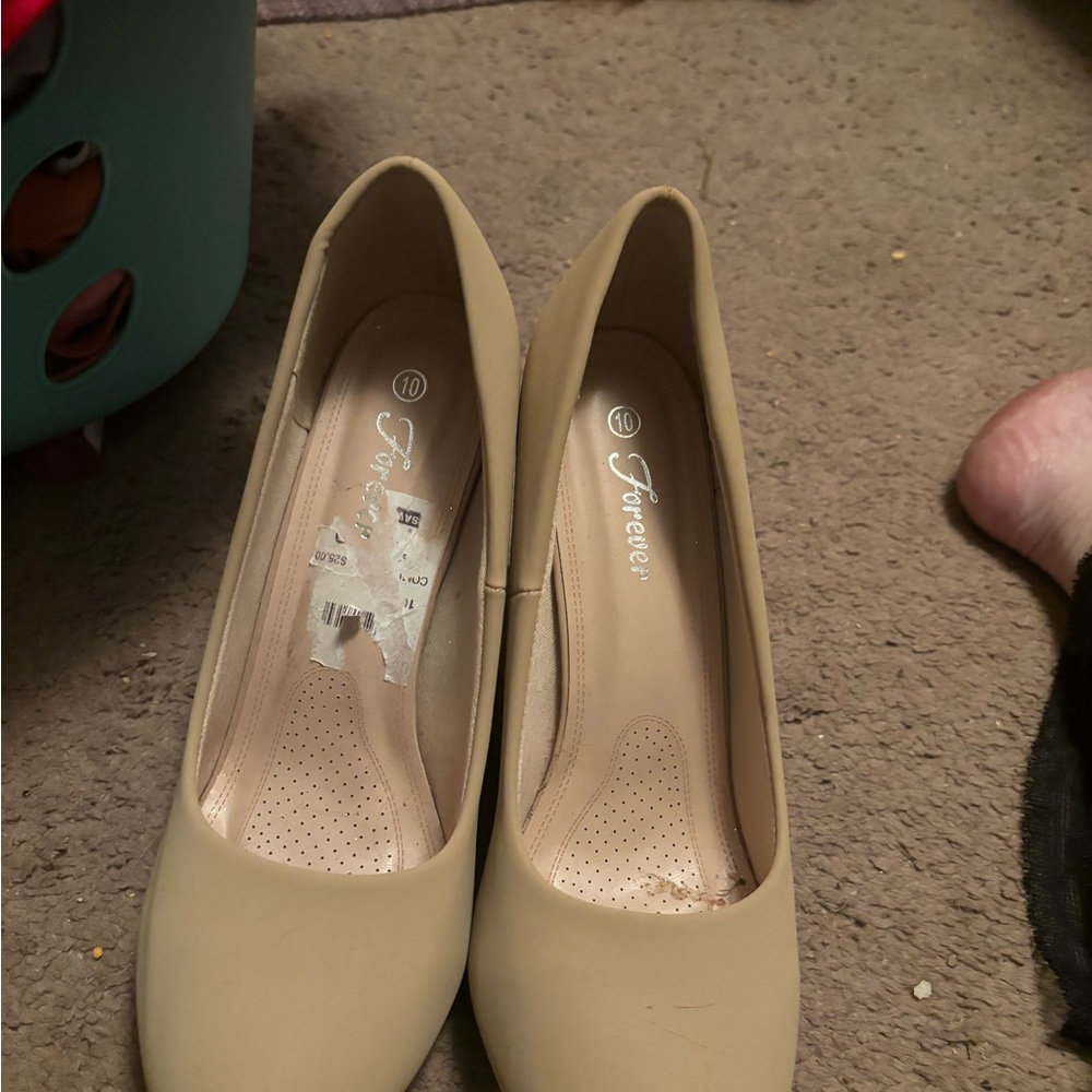 Tan dress shoes. Never worn.  Very nice